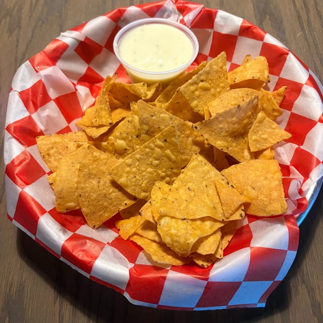Tortilla Chips & Queso Dip.